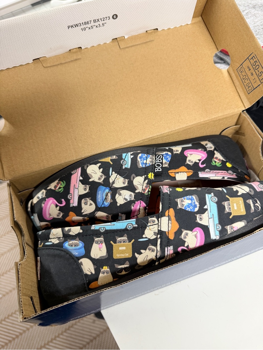 Skechers BOBS Black Slip-On Shoes with Colorful Cat Print